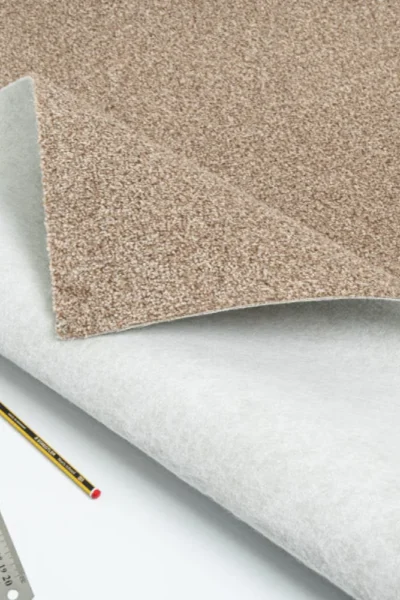 Textured warm beige carpet tiles