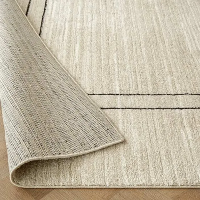 Contrast Black Border Rug